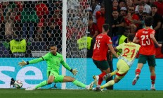 爱游戏-葡萄牙队成功晋级下一轮比赛